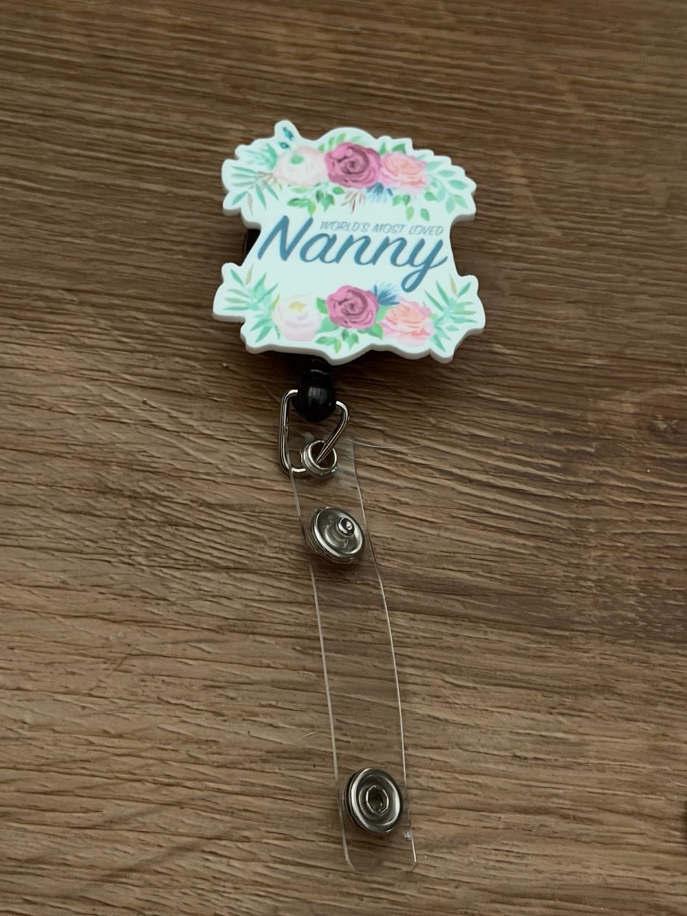World's Most Loved Nanny Floral Badge Reel - White/Pink